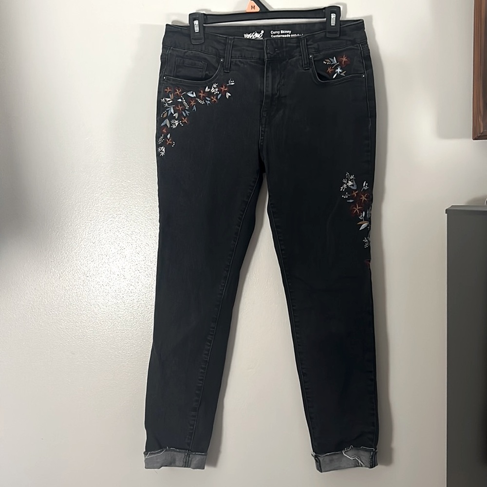 Black and floral embroidered skinny jeans